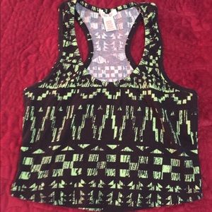 Neon green print over black crop top